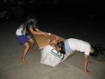 Girls_enjoying_the_box_Outreach_stuff_were_brought_in_320x240
